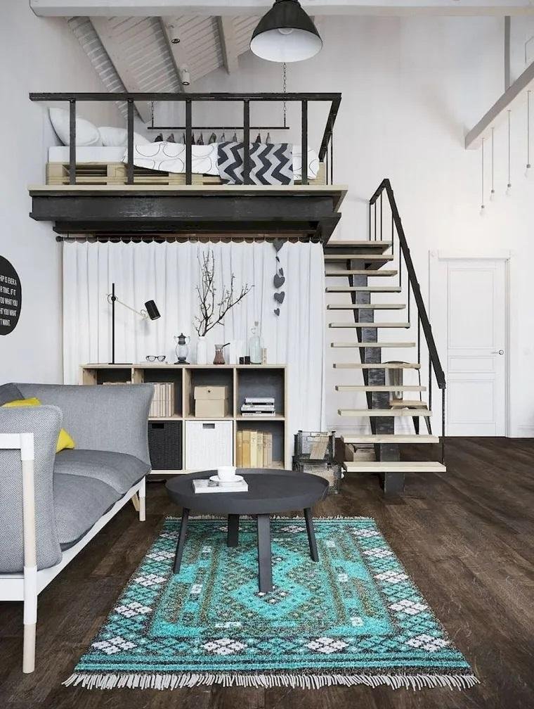Une mini mezzanine avec lit en palettes et design industriel